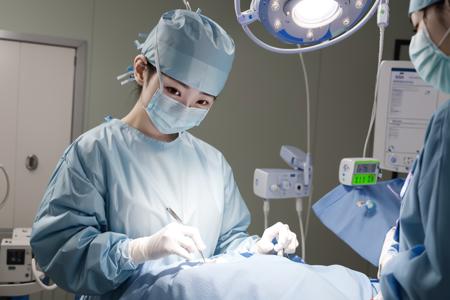 Female Surgeon / Surgical Nurse